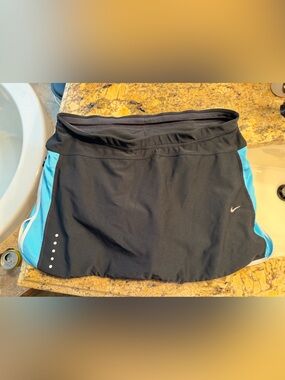 Nike Women’s Black and Light Blue Skirt